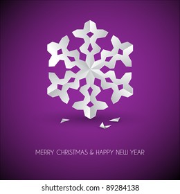 Vector white paper christmas snowflake on a purple background