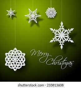 Vektor-weißes Papier, Weihnachten und Schneeflocken auf grünem Hintergrund