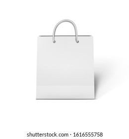 Vector white paper shopping bag with handles up.