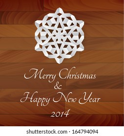 Vector white paper snowflake on a wooden background - rustical christmas card