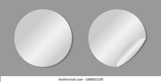 Vector white realistic round paper adhesive stickers with curved corner on gray background.