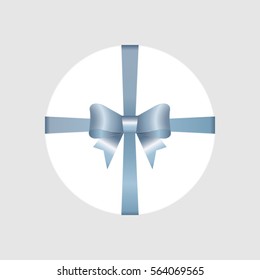 Vector White Round Gift Box with Shiny Light Blue Satin Bow and Ribbon Top View Close up Isolated on White Background. 
