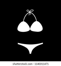 Vector white silhouette illustration of  bikini swimming suit icon isolated on black background. 