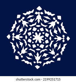 Vector white snowflake on a blue background. Large paper snowflake carved by hand