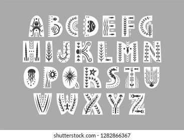 Vector white uppercase alphabet decorated with undersea black patterns.