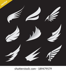Vector white wing icons set on black background