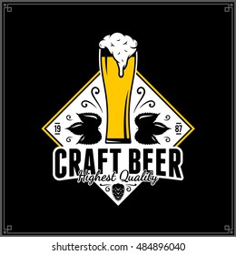 Vector white and yellow vintage beer logo isolated on black background