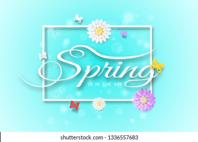 Vector wide poster of Spring is in the air on the gradient blue background with square frame, glow, flowers and butterflies arrange on the center.