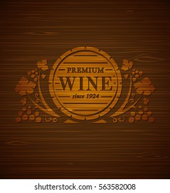Vector wine emblem with grape bunches and grape leaves on a wooden background