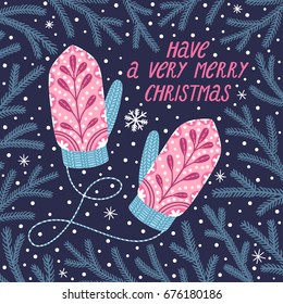 Vector winter background with knitted mittens and hand written text "Have a very merry Christmas". Holiday card.