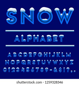 Vector of winter blue font and alphabet. A set of alphabet letters and numbers with snow caps on top. Stock typeface for your headers and any typography design.