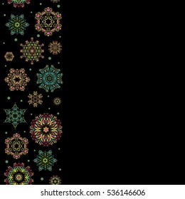 Vector winter design on black background. Happy smiling green, orange and violet snowflakes seamless pattern. Christmas and New Year theme. Snowflakes decorated with circles and dots.
