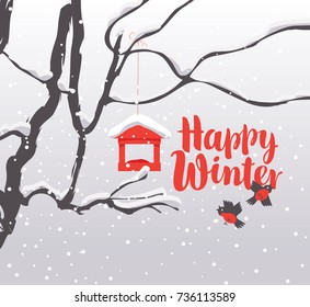 Vector winter landscape with red calligraphic inscription Happy Winter, with snow-covered branches of a tree, bullfinches and a bird feeder in the snow in flat style