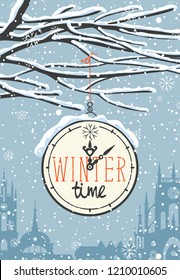 Vector winter landscape with words winter time on the clock, with snow-covered tree branches on the background of the evening sky with snowflakes and the old European town