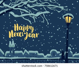 Vector winter night cityscape at the snow-covered park with the branches of a tree, a light street lamp and a cat on a fence on a background of roofs of the old town. Yellow inscription Happy New Year