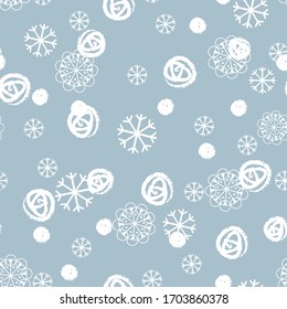 Vector winter pattern with the snowflakes on the blue background