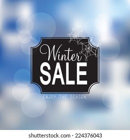 Vector winter sale poster with glittery lights - vector