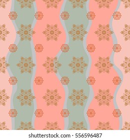 Vector Winter seamless pattern on a wave Background with beige and orange Snowflakes and dots. Can be used for textile, parer, scrapbooking, wrapping, web and print design.