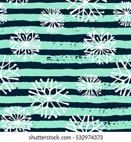 Vector  winter seamless pattern with  snowflakes and stripes. Trendy hand drawn texture. Design for textile, wall art, wrapping paper, wallpaper and other uses