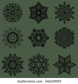 Vector winter snowflake collection on a green background. Abstract set of 9 snowflakes with floral elements.