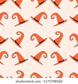 Vector witch hat seamless pattern with orange colors. Creative patterns for baby and kids fashion textile wrapping halloween theme ready for print.