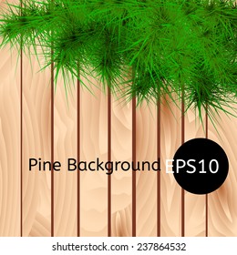 Vector wooden background with Christmas tree branch. Eps10
