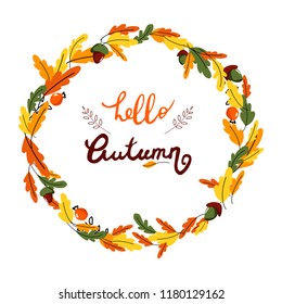 vector wreath circle frame with autumn leaves, acorns and red berries, hand lettering hello autumn and decorative elements on white background