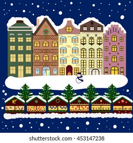 Vector xmas card with a decorated snowy old town at Christmas eve