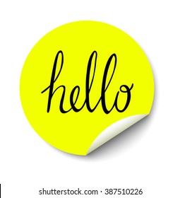 Vector yellow circle sticker with curled corner and hello text inside