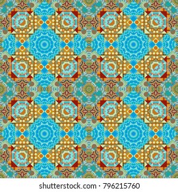 Vector yellow, green and blue seamless background pattern with rhombuses.