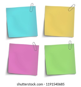 Vector yellow, green, rosy, blue sticky notes attached by metallic paper clips isolated on white background