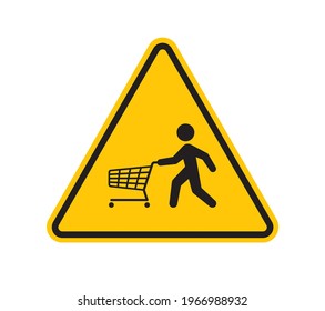 Vector yellow triangle sign - black symbol figure carrying with shopping cart. Isolated on white background.