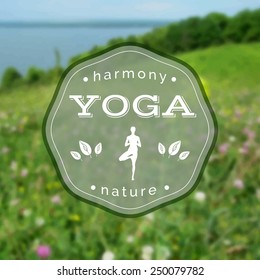 Vector yoga illustration. Name of yoga studio on a blurred nature background. Yoga class motto. Vector yoga sticker. Healthy lifestyle. Poster for yoga class with a blooming meadow photo background.