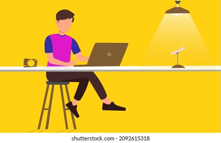 Vector Of A Young Man Working On  Laptop Sitting On The Stool. Busy Man Operating Laptop On The Desk. Illustration Of Indoor Home Or Office With Table, Stool, Hanging Lights, Camera And Mobile Stand. 