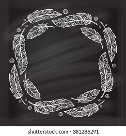 Vector zendoodle feathers frame on a chalkboard background