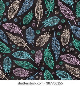 Vector zendoodle feathers seamless pattern on a chalkboard background. Boho style.