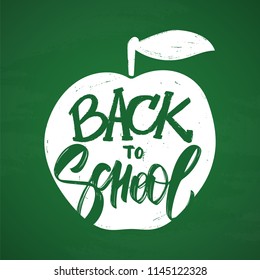 Vectro illustration: Hand drawn type lettering of Back to School and apple on chalkboard background