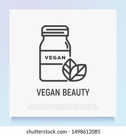 Vegan beauty thin line icon: glass bottle with leaf. Modern vector illustration for organic shop.