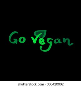 Vegan Day vector label. Lettering "Go Vegan". Green leaf.