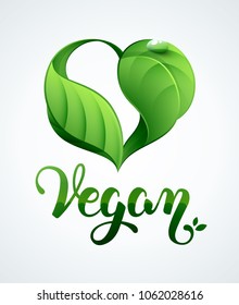 Vegan and green leaves in a heart shape