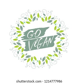 Vegan hand made lettering logo in original style. Hand drawn calligraphic green vegan eco template. Go Vegan vector lettering with on round banner with green leaves