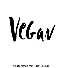 Vegan hand written calligraphy lettering with leaf for cafe menu design. Brush lettering Element for labels, logos, badges. Vegan menu. Vector illustration.