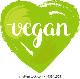 Vegan heart, vector drawing: the word vegan, written in brushpen calligraphy, on a vibrant green heart, painted with loose brushstrokes; an illustration for a restaurant menu or vegan day celebration