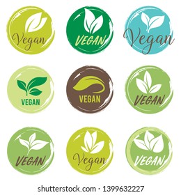 Vegan icon set. Bio, Ecology, Organic logos and badges, label, tag. Green leaf on white background. Hand drawn bio healthy food badges, set of raw, vegan, signs, organic and elements.