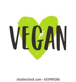 Vegan lettering and green ink heart. Vector hand drawn sign. Isolated on white