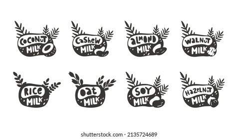 Vegan milk, black stickers set for packaging design. Hand drawn lettering with nuts, beans, leaves, sprigs. Silhouette illustration, print, emblem for vegan drink