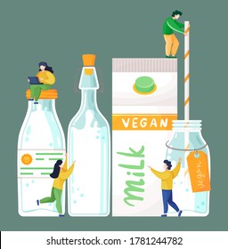 Vegan milk concept. Bottles, package with organic natural free dairy product. Man drinking vegan milk with huge straw. Happy people like vegan product. Woman with laptop sitting at cap of bottle