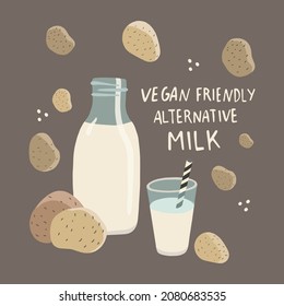 Vegan plant based potato milk in transparent bottle. Alternative potato milk and potato tubers