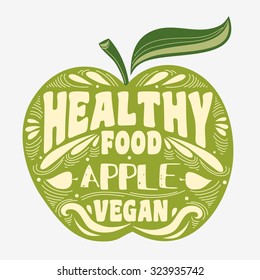 Vegan typographic print with apple. Vegan. Healthy food.  Can be used as a print on T-shirts and bags, label, restaurant menu and shop of organic food. Hand drawn. Inspirational eco poster.