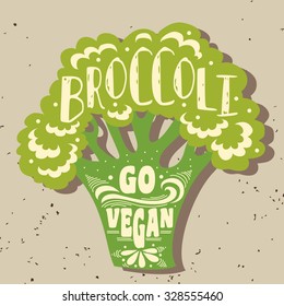 Vegan typographic print with broccoli. Go vegan. Can be used as a print on T-shirts and bags, label, restaurant menu and shop of organic food. Hand draw. Inspirational eco poster.